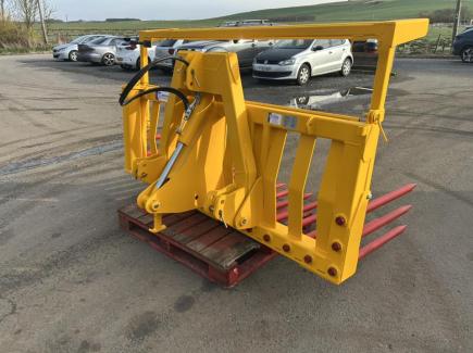 Heavy duty hydraulic tipping stone fork