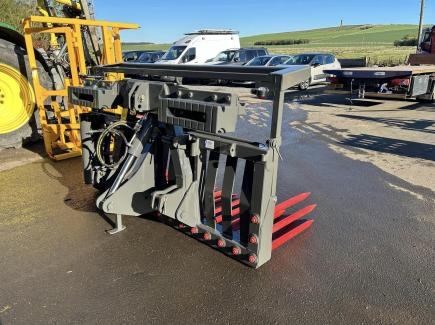 One very hi-spec hydraulic tipping stone fork with quick hitch system