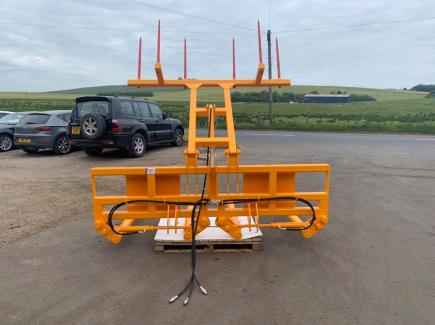 Double Wrapped Bale Handler with a Transporter Top