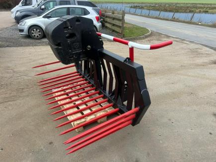 6' 6” Stone Fork with 18 tines c/w 3 point linkage and cone and pin brackets and weight frame to carry New Holland curved weights