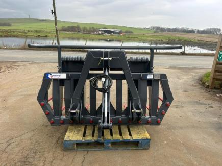 5' 6” hydraulic tipping stone fork with 16 tines and 3 point linkage and weight frame