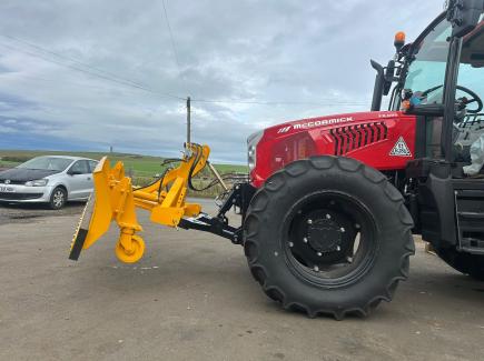 Snow blade and lifting linkage for McCormick Tractor