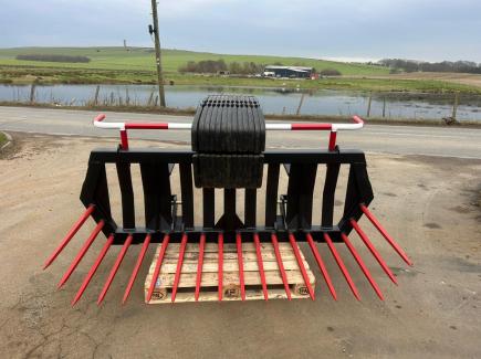 6' 6” Stone Fork with 18 tines c/w 3 point linkage and cone and pin brackets and weight frame to carry New Holland curved weights