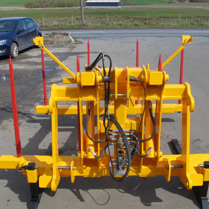 Octa-Quad Bale Handling System - front section for carrying 4 round bales or 2 Heston bales at a time. Showing folding tines version.