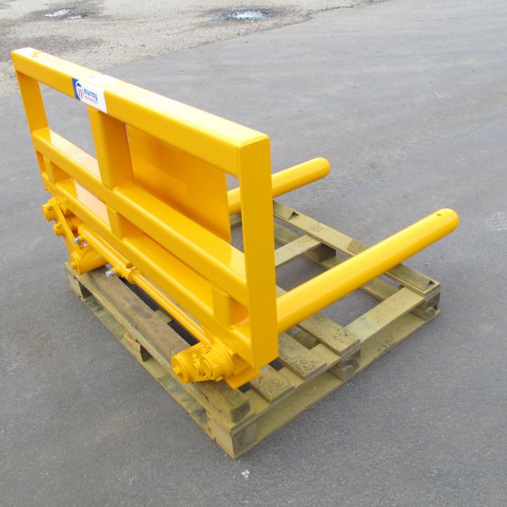 Murray Machinery Wrapped Bale Handler for handling and stacking wrapped round silage bales.