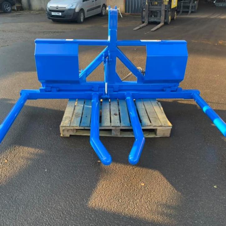 HD double fold up wrapped bale handler finished in New Holland blue