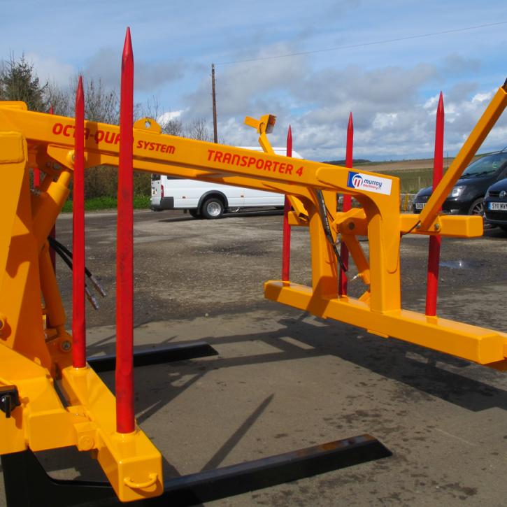 Octa-Quad Bale Handling System - front section for carrying 4 round bales or 2 Heston bales at a time. Showing folding tines version.