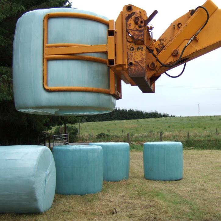 Wrapped Bale Clamp for handing wrapped silage bales.