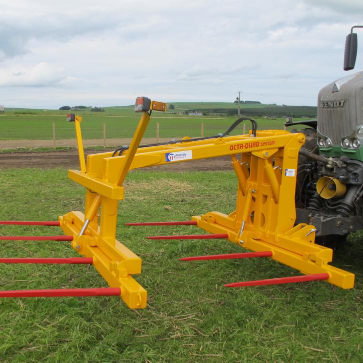 Octa-Quad Bale Handling System - front section for carrying 4 round bales or 2 Heston bales at a time. Showing folding tines version.