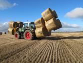 Octa-Quad Bale Handling System - front and rear sections for carrying 12 round bales at a time.