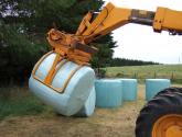 Wrapped Bale Clamp for handing wrapped silage bales.