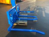 HD double fold up wrapped bale handler finished in New Holland blue