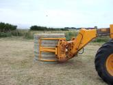 Wrapped Bale Clamp for handing wrapped silage bales.