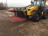 8ft wide Muck Fork with filled in middle, top greedy board and road safe bar