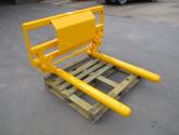 Murray Machinery Wrapped Bale Handler for handling and stacking wrapped round silage bales.