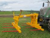 Octa-Quad Bale Handling System - front section for carrying 4 round bales or 2 Heston bales at a time. Showing folding tines version.